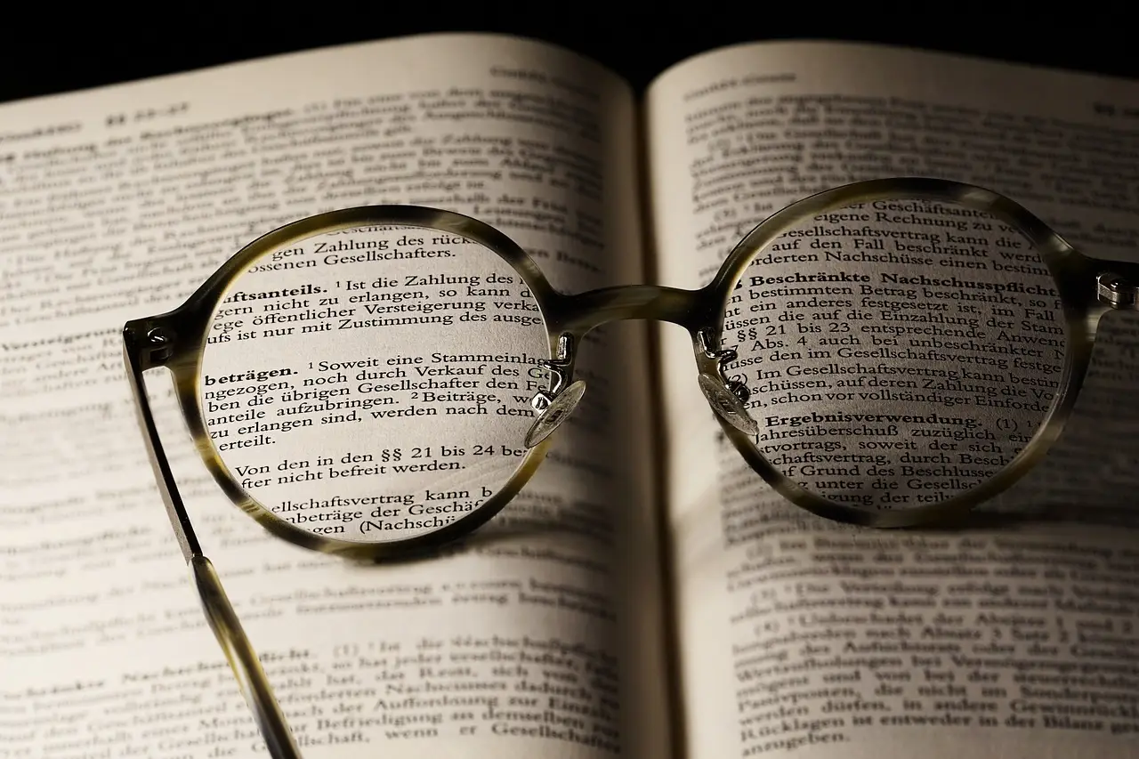 Intellectual Property book and glasses